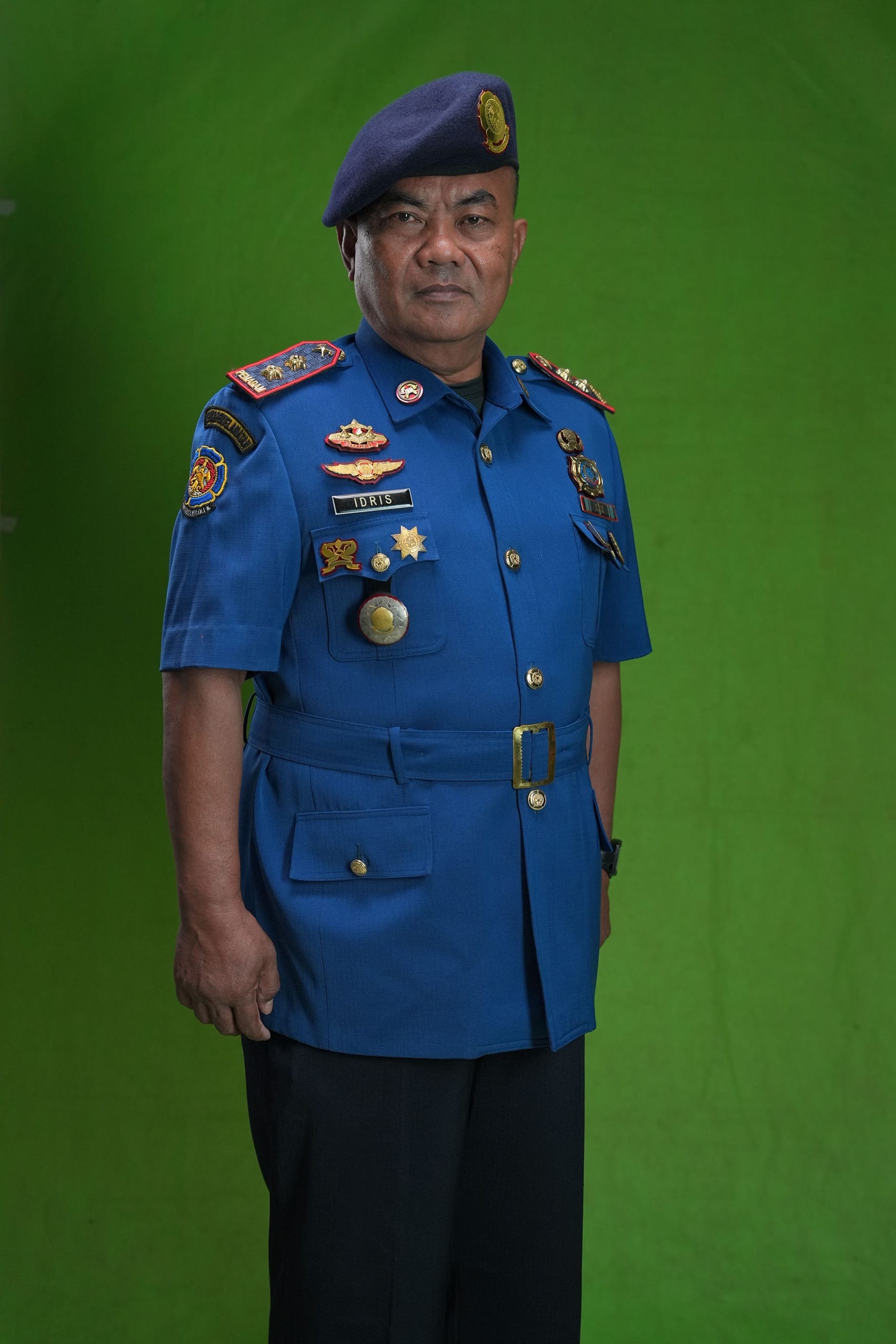Idrisman, S.H., M.Si.