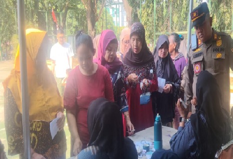 Melaksanakan Pengamanan Pembagian Beras Bulog Dari Kemensos 3