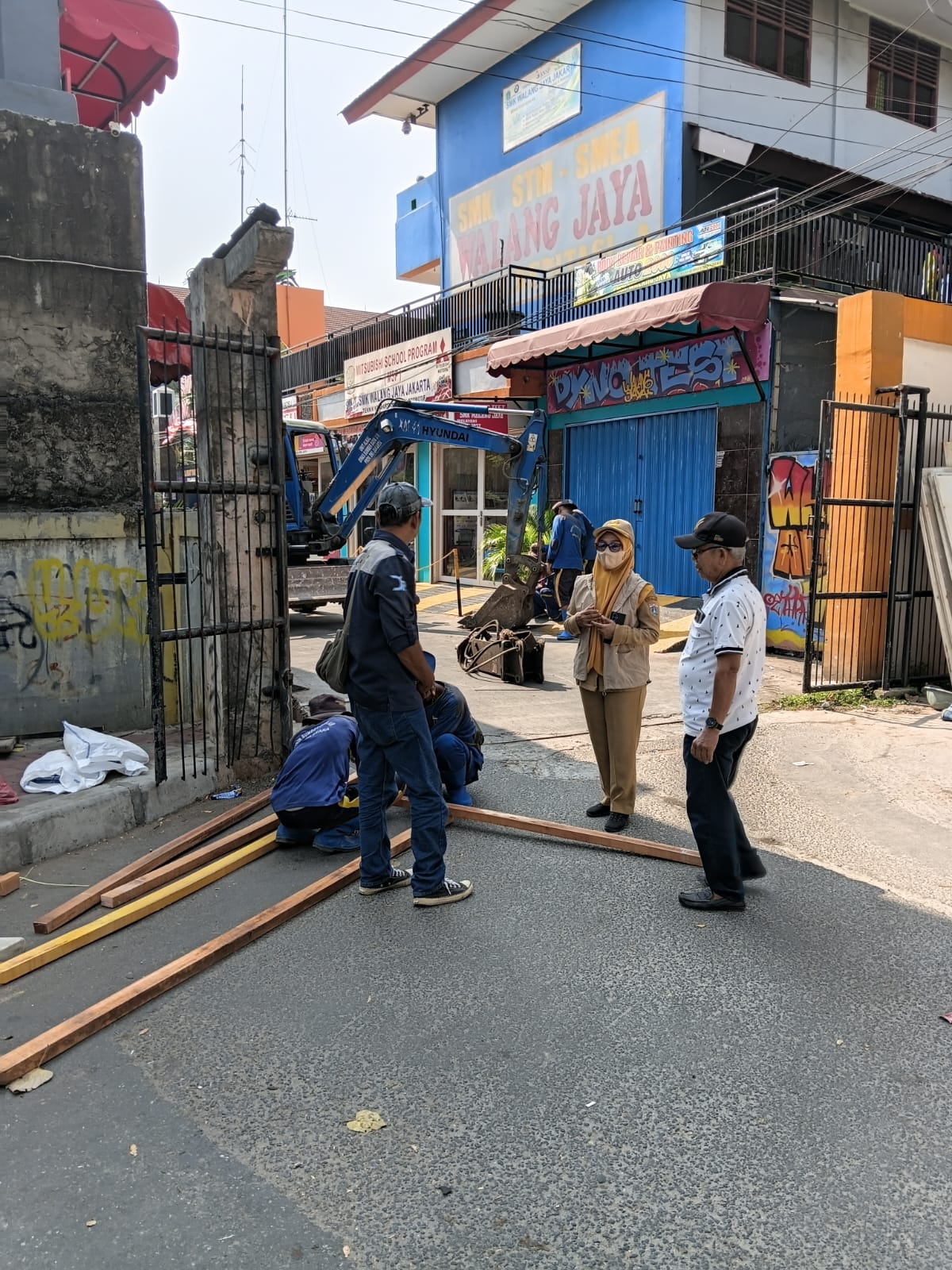 Pembuatan Crossing (sudatan/potongan) Saluran air di Jalan STM Walang, Kelurahan Tugu Selatan, Kecamatan Koja, Jakarta Utara 6