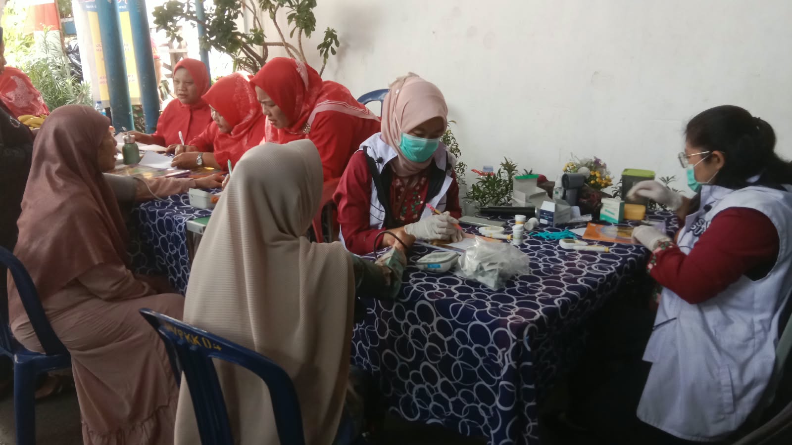 Monitoring Posyandu Balita dan Lansia serta Kunjungan Balita dengan Masalah Gizi di RW 04 2