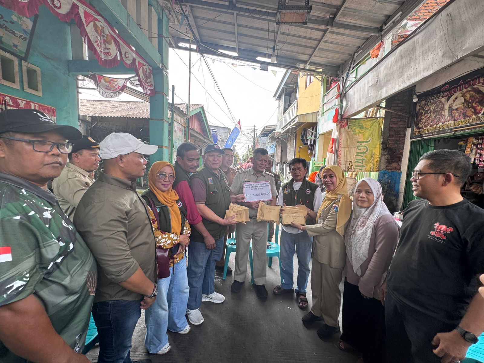 Penyerahan Galangan Dana Untuk Korban Kebakaran di Kelurahan Warakas 2