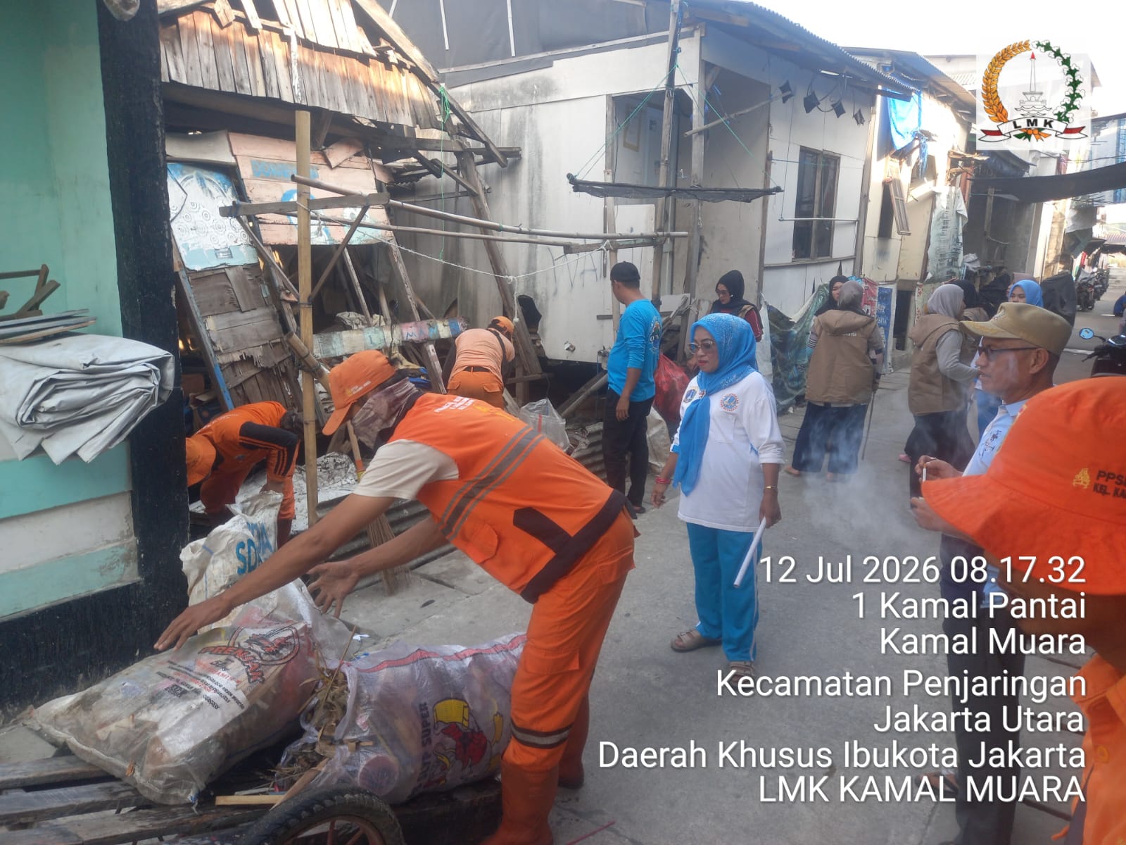 Sinergi Kerja Bakti di Kampung Nelayan, PPSU Kelurahan Kamal Muara Bersama Warga Bersihkan Saluran Air Demi Cegah Genangan 5